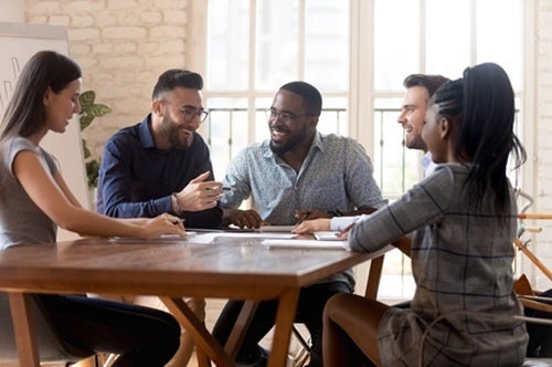A group of people having a conversation