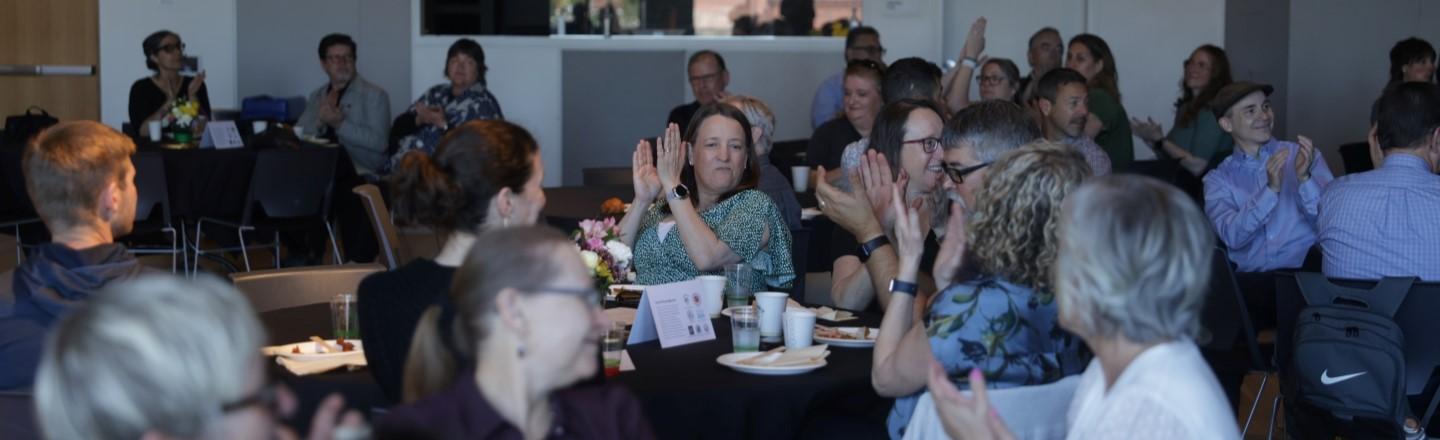 employees clapping for each other