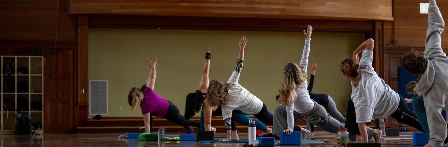 employees in yoga class